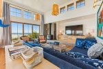 Living room with ocean views at Whaletopia